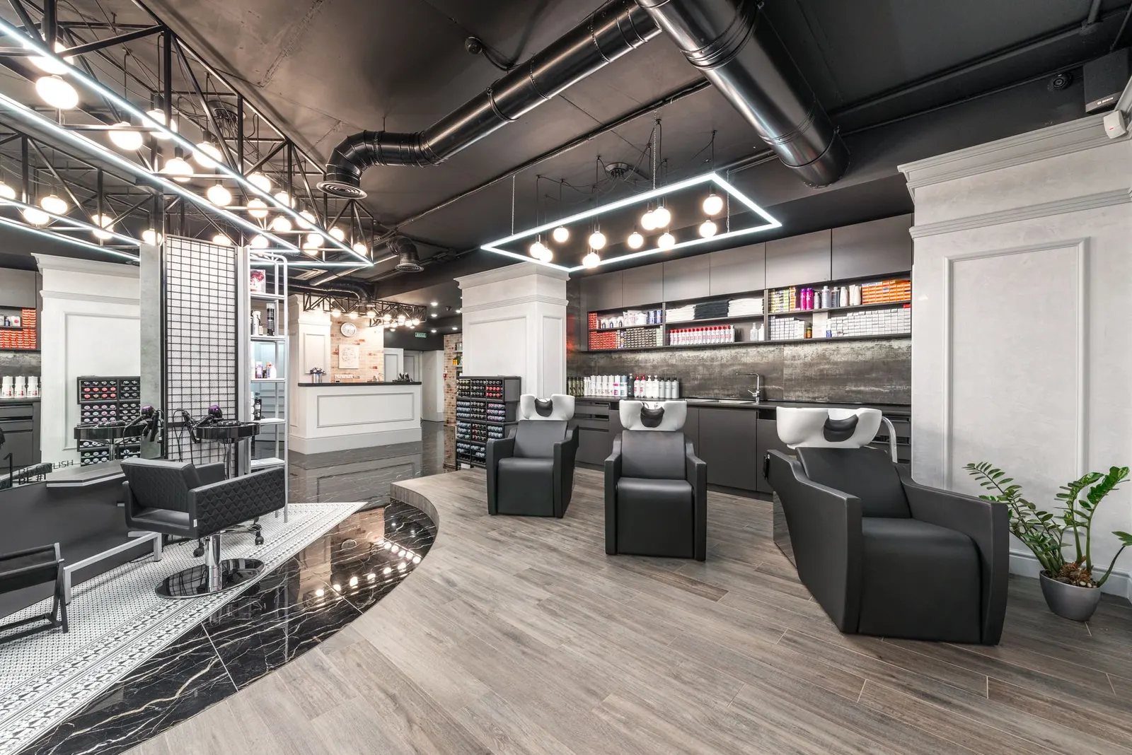 Espace bacs à shampoing du Salon K, ambiance moderne et végétale